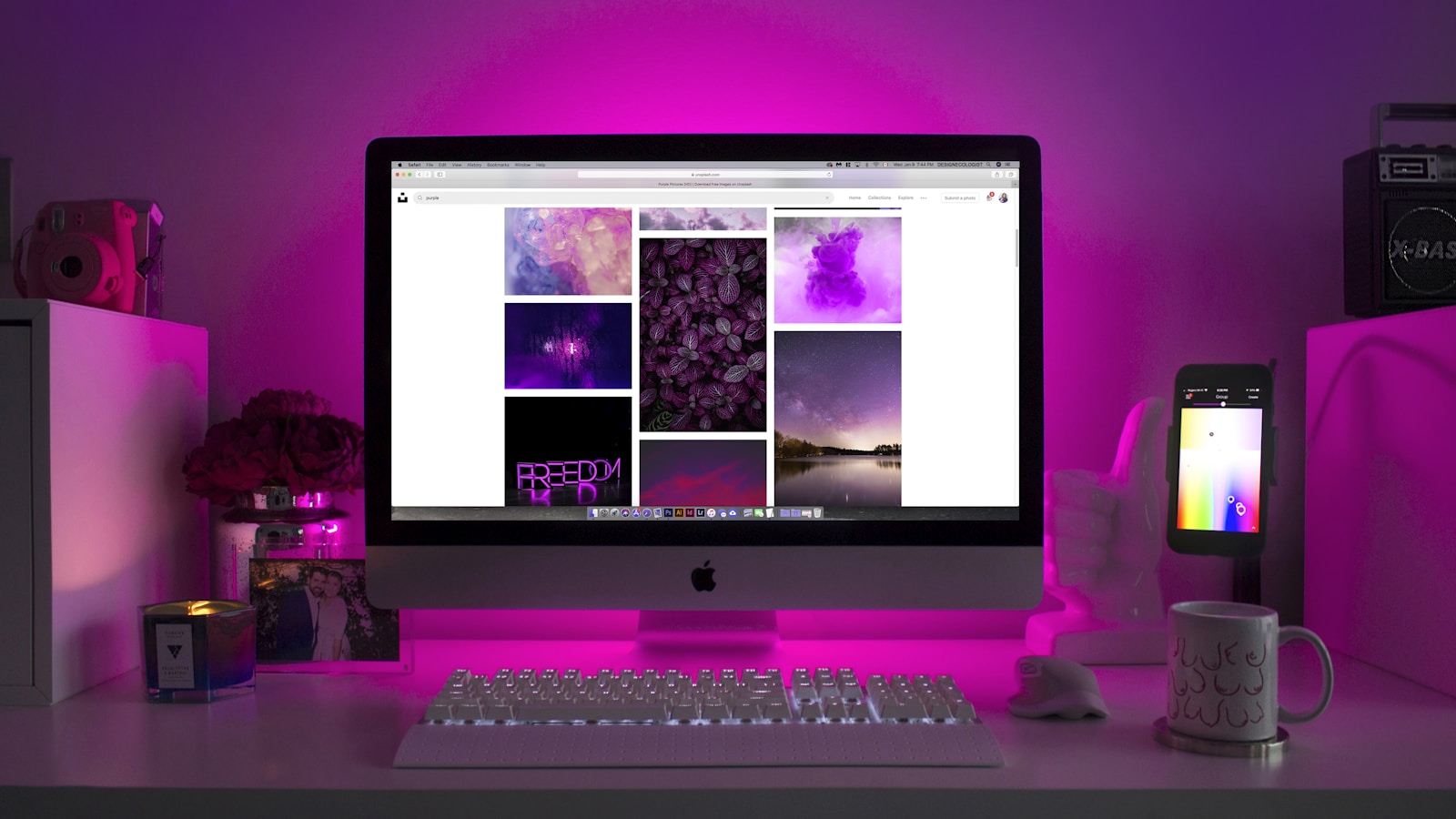 Developer workspace with two large monitors showing code and a quiet desktop