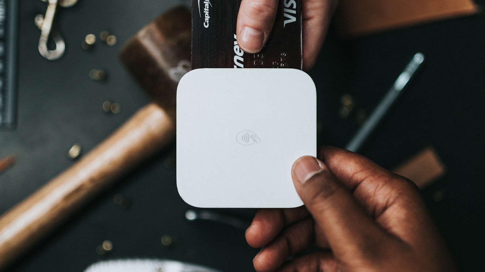 Stack of premium travel credit cards on a passport and boarding pass