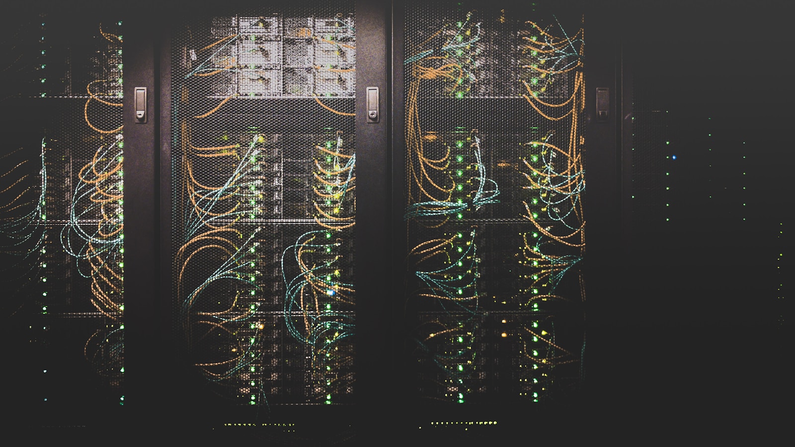 Server racks in a modern cloud data center with blue lighting