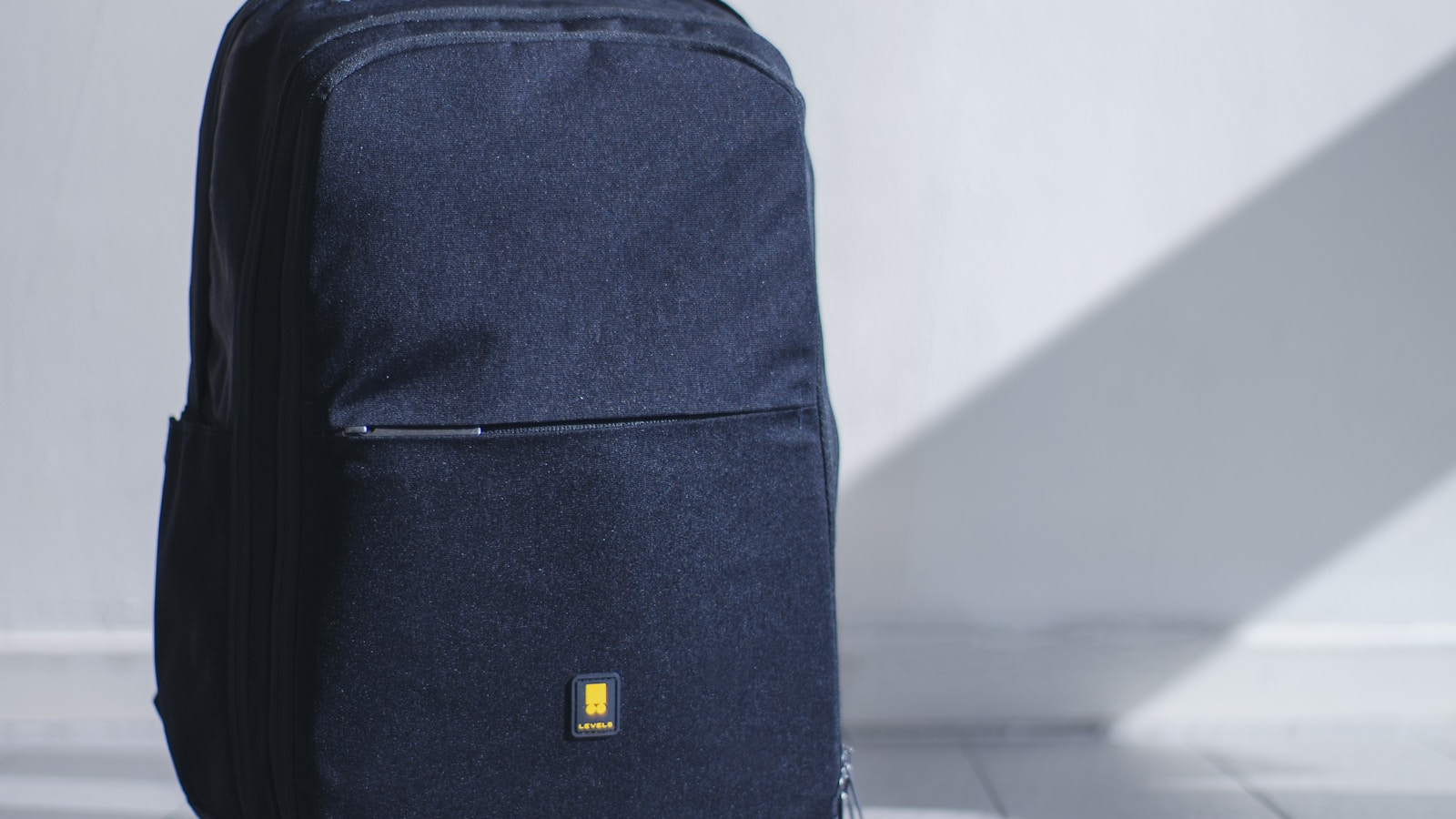 Open carry-on suitcase with neatly packed clothes and travel essentials